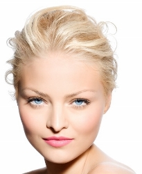 Close-up of a beautiful woman with glowing skin