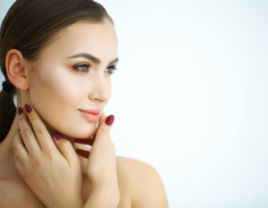 Radiant woman showcasing smooth skin, embodying youthful beauty with BOTOX.