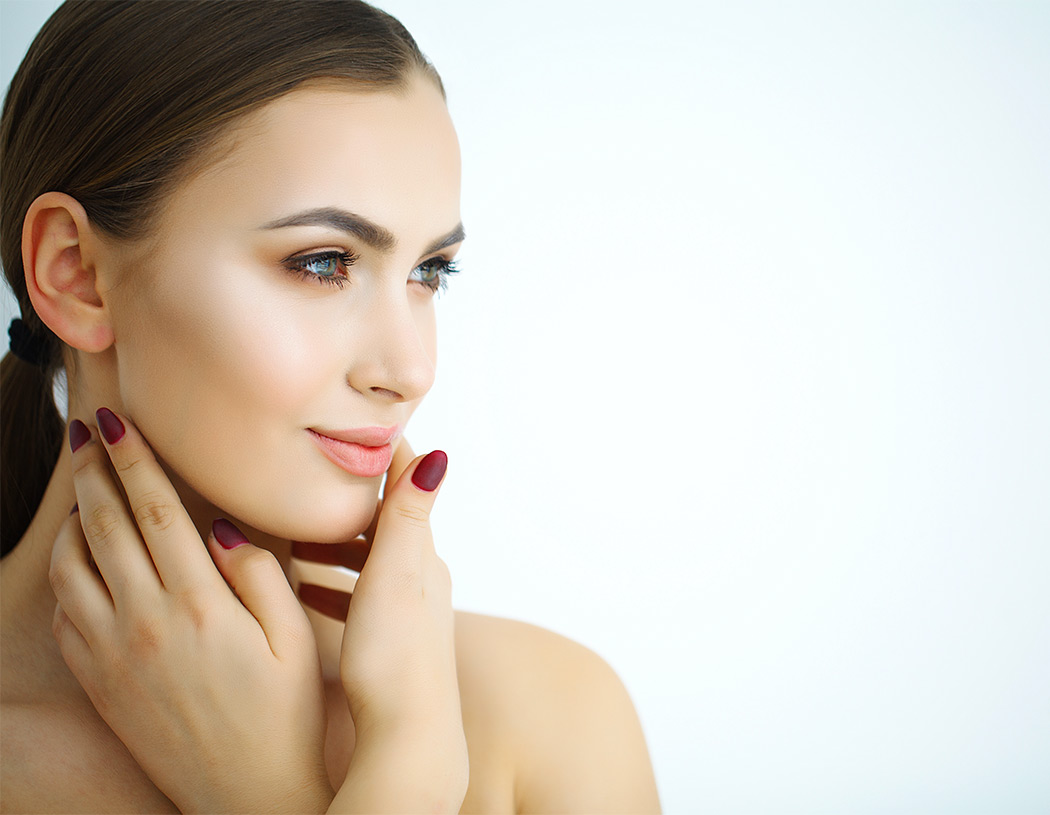 Radiant woman showcasing smooth skin, embodying youthful beauty with BOTOX.
